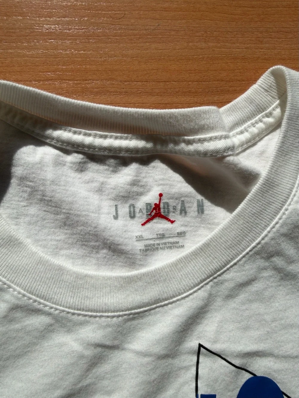 Jordan White Short-Sleeve Tee with Blue PARIS Graphic